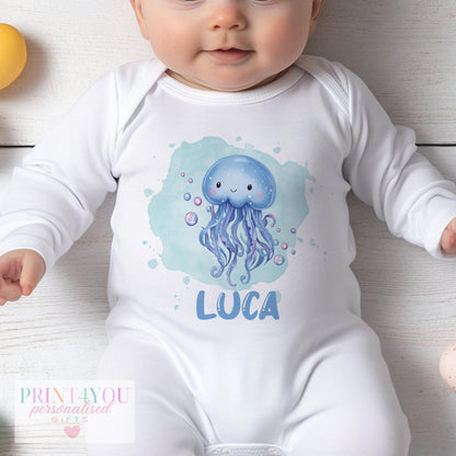 Personalised jellyfish baby vest in soft cotton, printed with baby's name for an ocean-theme outfit.