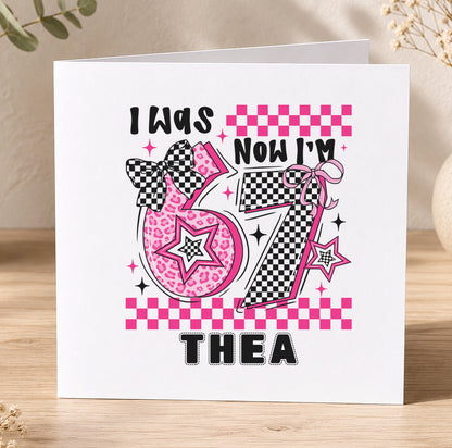 Pink and black checked 7th birthday card personalised with the name Thea and the number seven