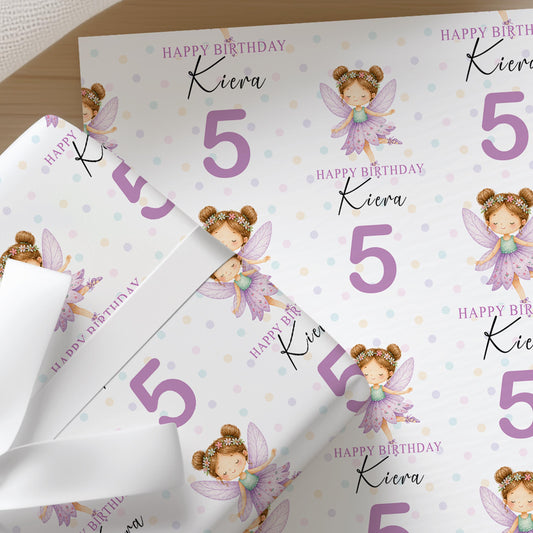 Printed fairy birthday wrapping paper shown as wrapping paper