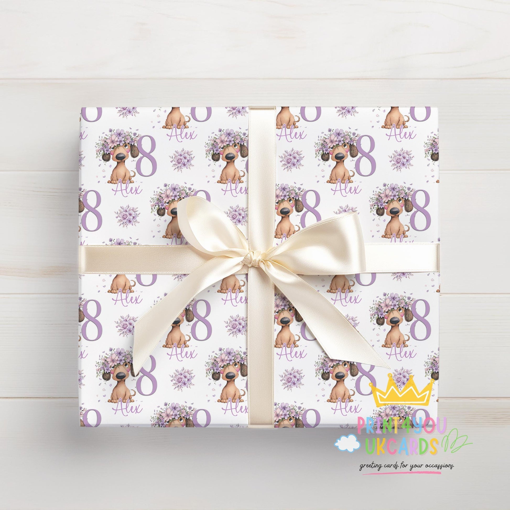 Personalised lilac floral dachshund wrapping paper laid flat showing the full repeating pattern.