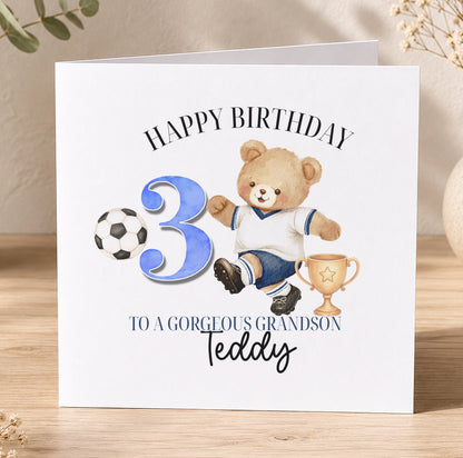 Square birthday card featuring a teddy bear dressed in a football kit holding a trophy, personalised for a boy's 3rd birthday.