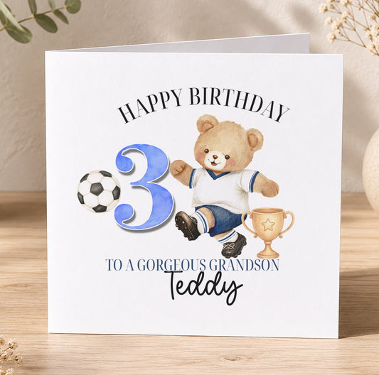 Square birthday card featuring a teddy bear dressed in a football kit holding a trophy, personalised for a boy's 3rd birthday.