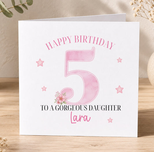 Pink personalised birthday card featuring a large number and the printed message 'Happy Birthday to a Gorgeous Daughter', shown here with the example name Lara.