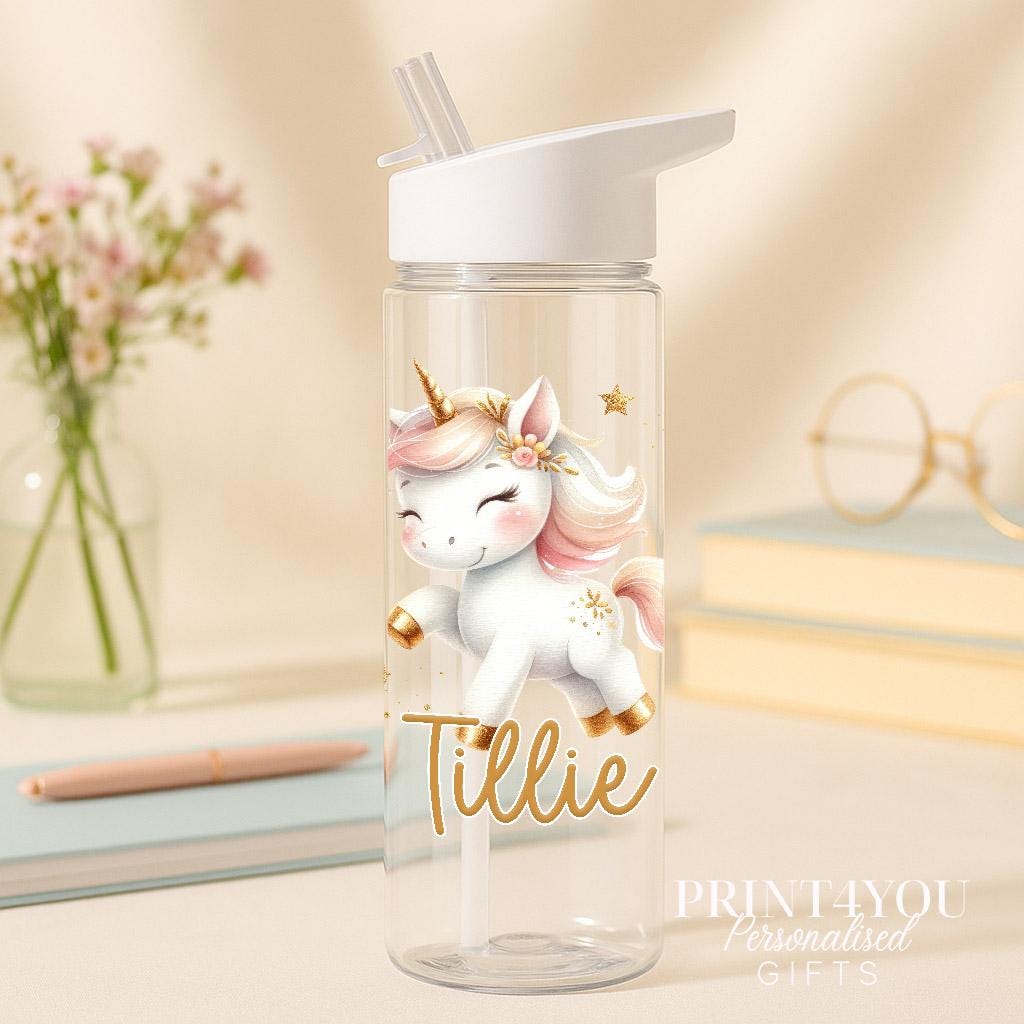 Personalised 750ml unicorn water bottle with flip straw lid, showing the UV-printed unicorn design and the child's custom name