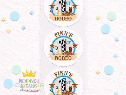 Strip of glossy round first birthday cowboy party stickers personalised with a child's name