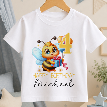 A white t-shirt with a cartoon bee holding a gift and the number 4, along with the text "Happy Birthday Michael".