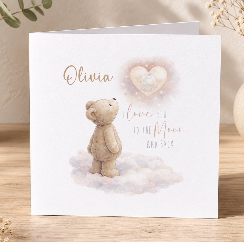 Greeting card illustration of a teddy bear standing on clouds gazing up at the moon, with elegant script for a personalised message
