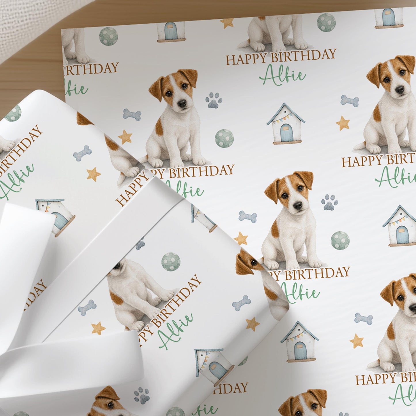 Close-up of the personalised Jack Russell wrapping paper showing the terrier illustration and custom name detail.