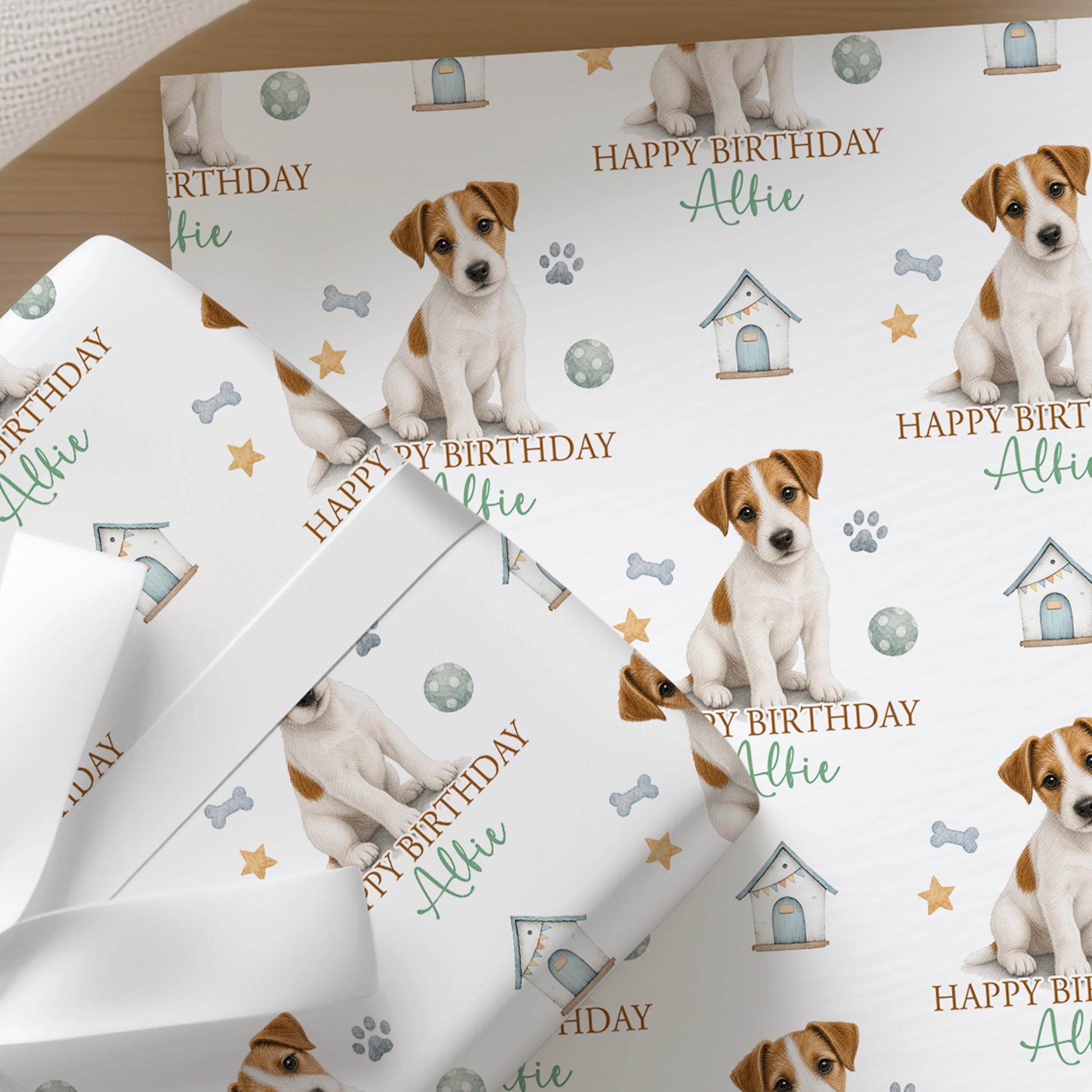 Close-up of the personalised Jack Russell wrapping paper showing the terrier illustration and custom name detail.