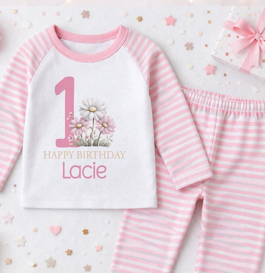 Personalised pink floral 1st birthday outfit with Happy Birthday name design, front view