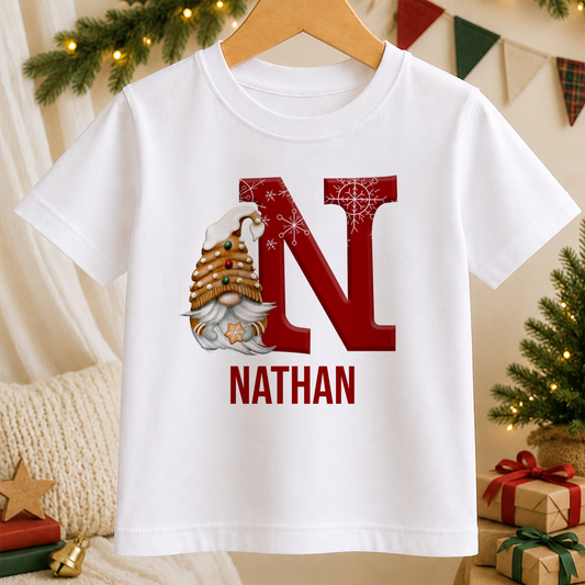 A white t-shirt with a red letter "N" and a gnome graphic, along with the name "Nathan" written below.