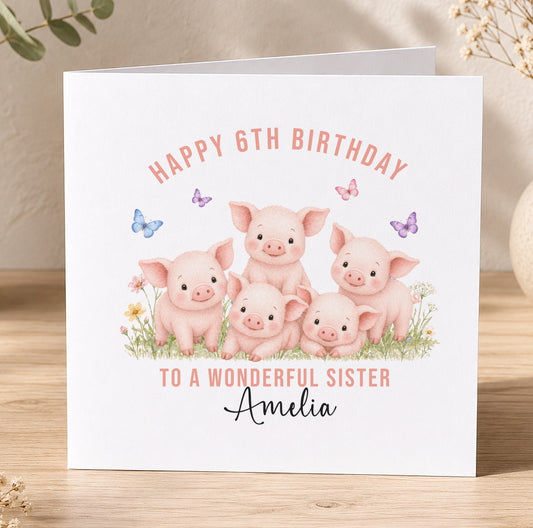Square birthday card with five pink piglets in a flower field surrounded by butterflies, personalised Happy 6th Birthday to a Wonderful Sister Amelia.