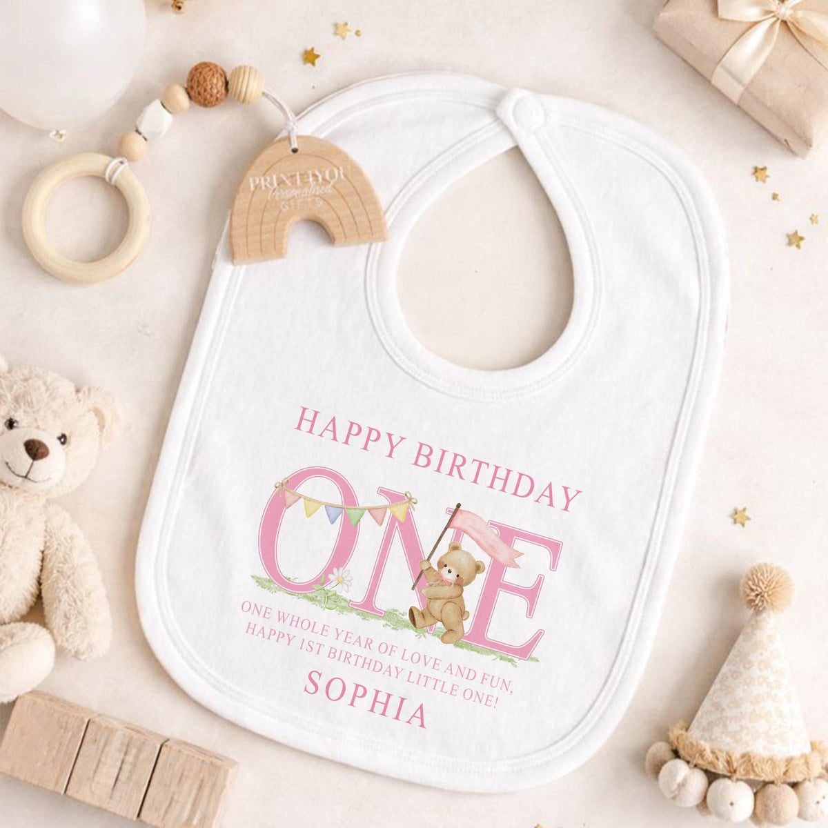 Close-up of the pink striped print showing the personalised name detail.