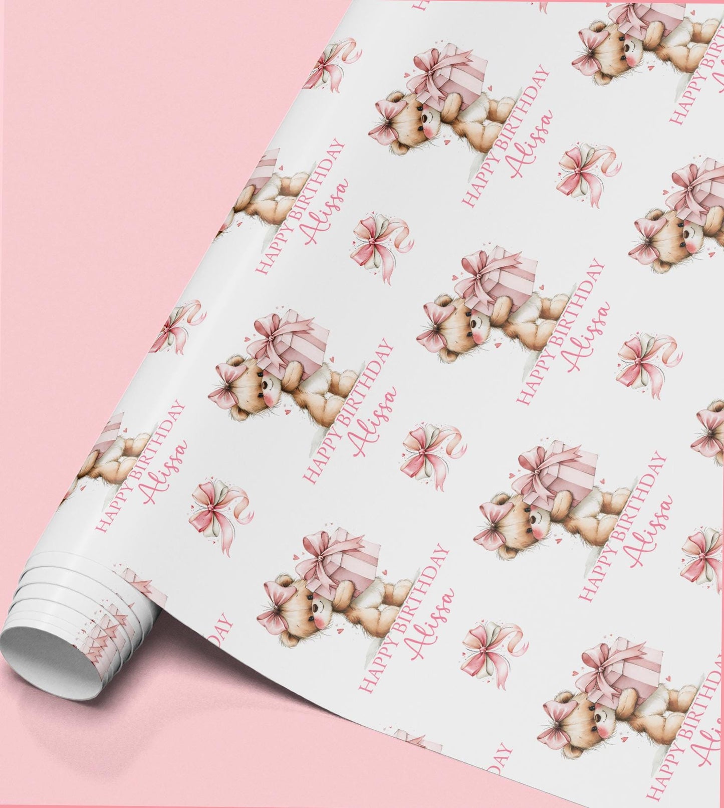 Personalised teddy bear birthday wrapping paper showing a teddy holding a pink present, with a custom girl's name and birthday message.