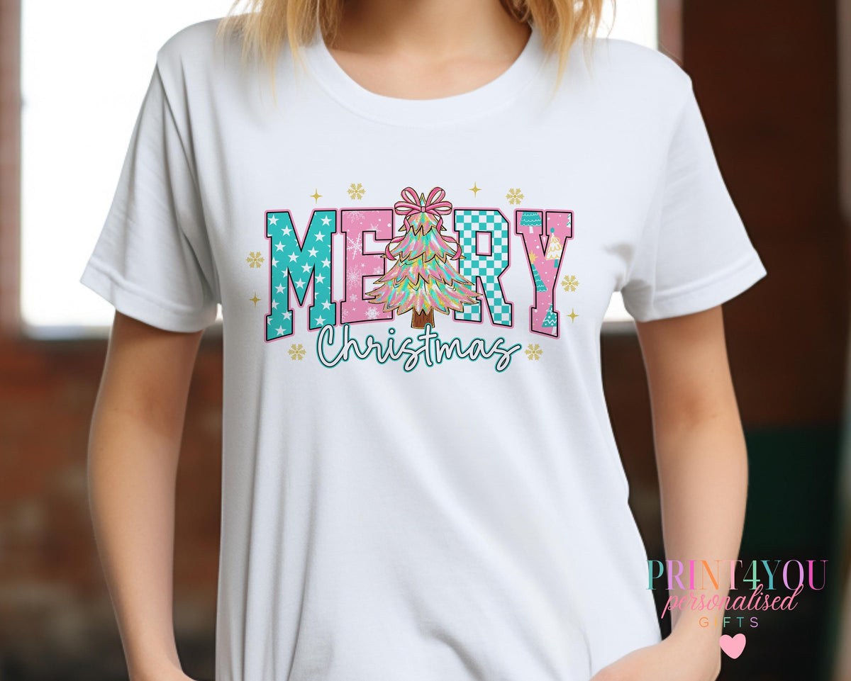 Baby wearing a personalised Christmas Tree design mummy and me t-shirt with 'Merry Christmas' slogan and custom name, 3-6 months