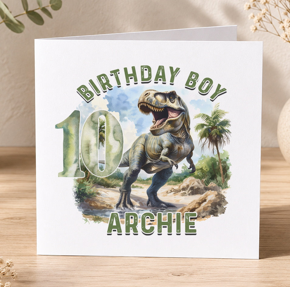 Personalised T-Rex dinosaur birthday card example showing custom name and age printed in the jungle design