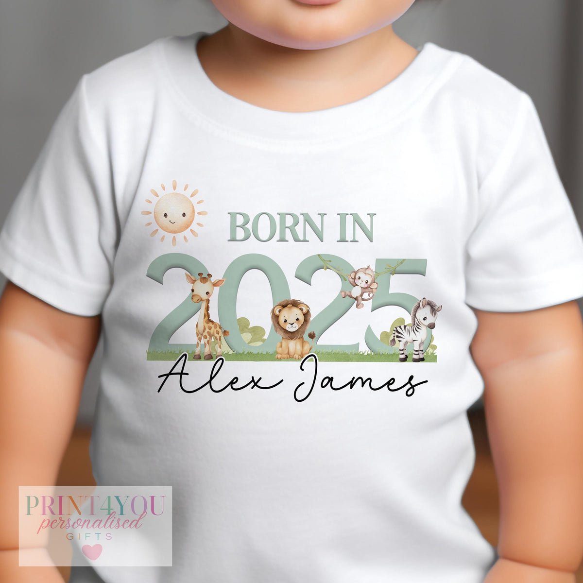 Close-up of personalised safari baby vest showing custom name detail.