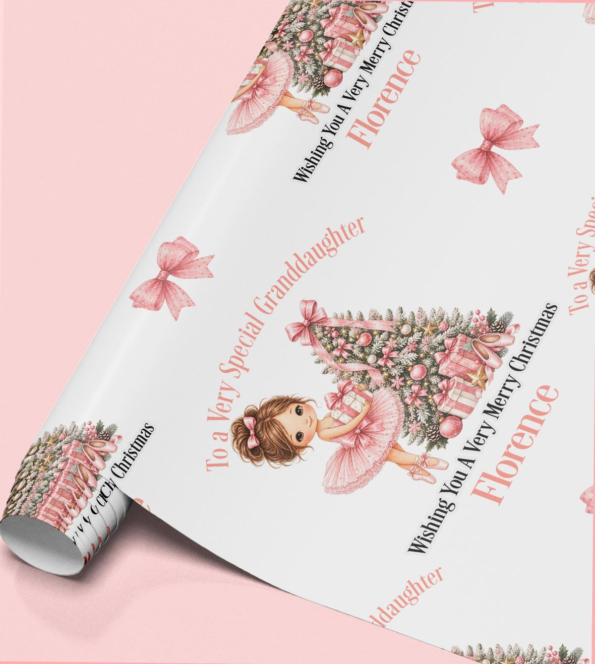 Rolled sheet of personalised ballerina Christmas wrapping paper with a name and relation wording