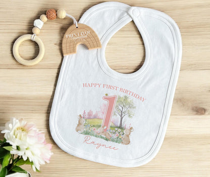 Personalised bunny rabbit first birthday pyjamas printed with the baby's name.