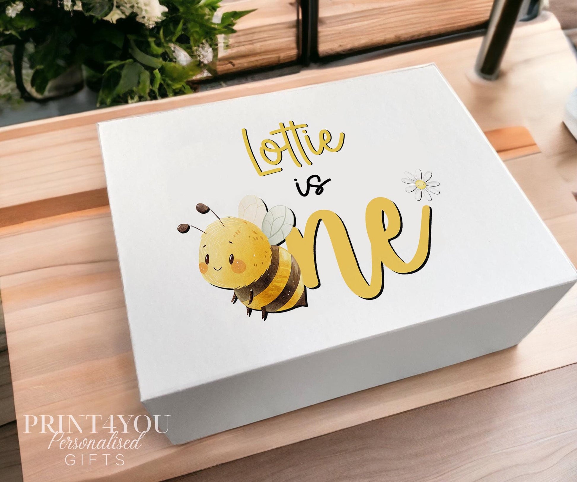 White magnetic keepsake box personalised with a bee and daisy design and child's name, medium size