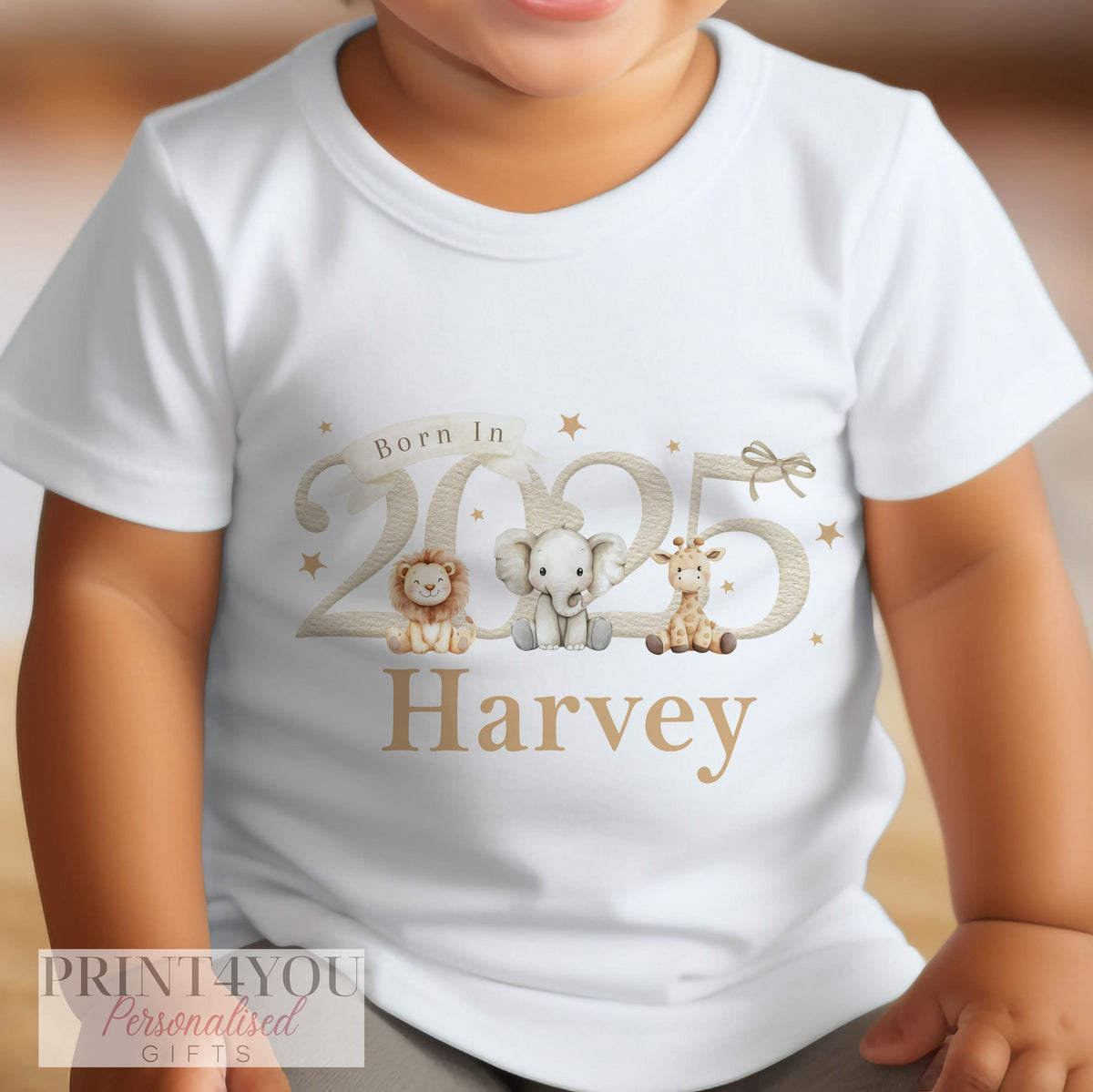 Personalised 'Born in 2025' safari baby vest laid flat, showing the 100% cotton fabric.