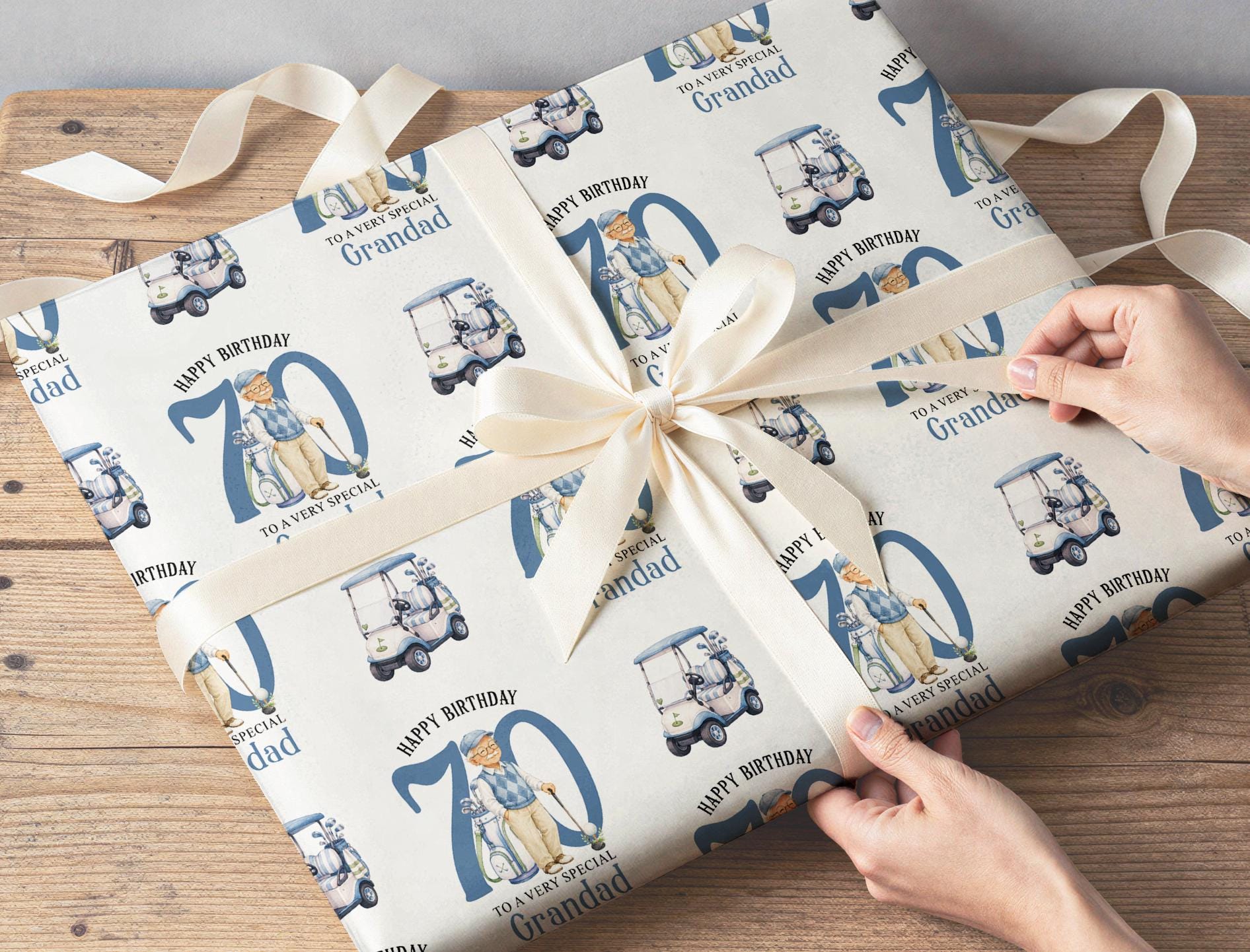 Personalised golf wrapping paper sheet laid flat showing the full repeating golfer and golf buggy pattern with age.