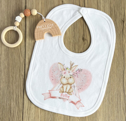 Close-up of the boho rabbit in a heart design printed on the personalised baby bib.