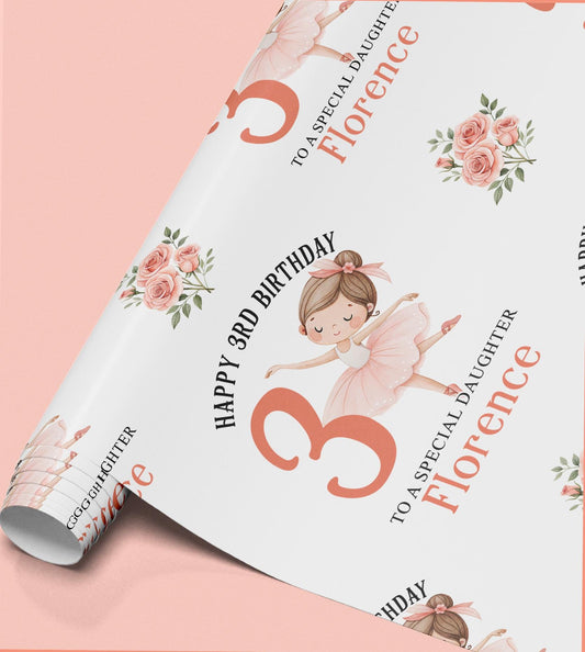 Personalised ballerina wrapping paper shown wrapped around a gift box to demonstrate the finished look.