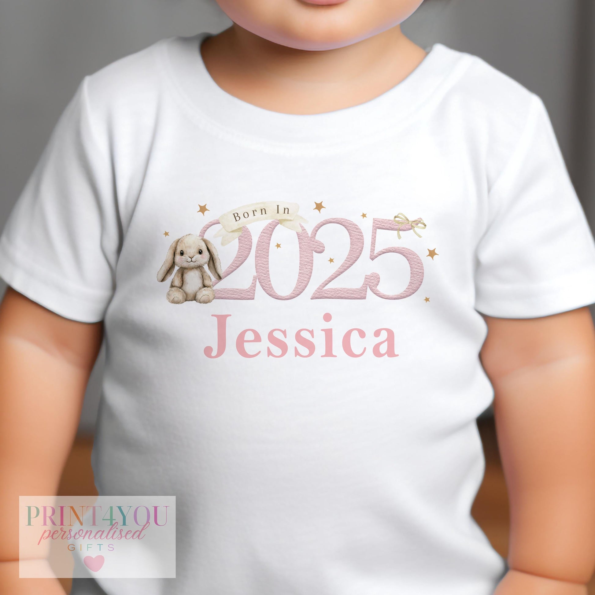 Pink bunny 'Born In 2025' personalised baby vest, part of the newborn gift set.