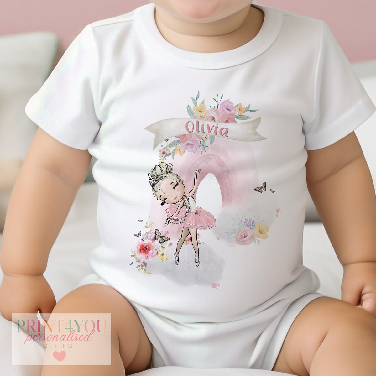 Personalised blonde ballerina rainbow vest for baby, printed with a custom name.