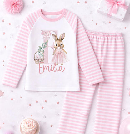 Front view of pink rabbit pyjama set showing the personalised name print