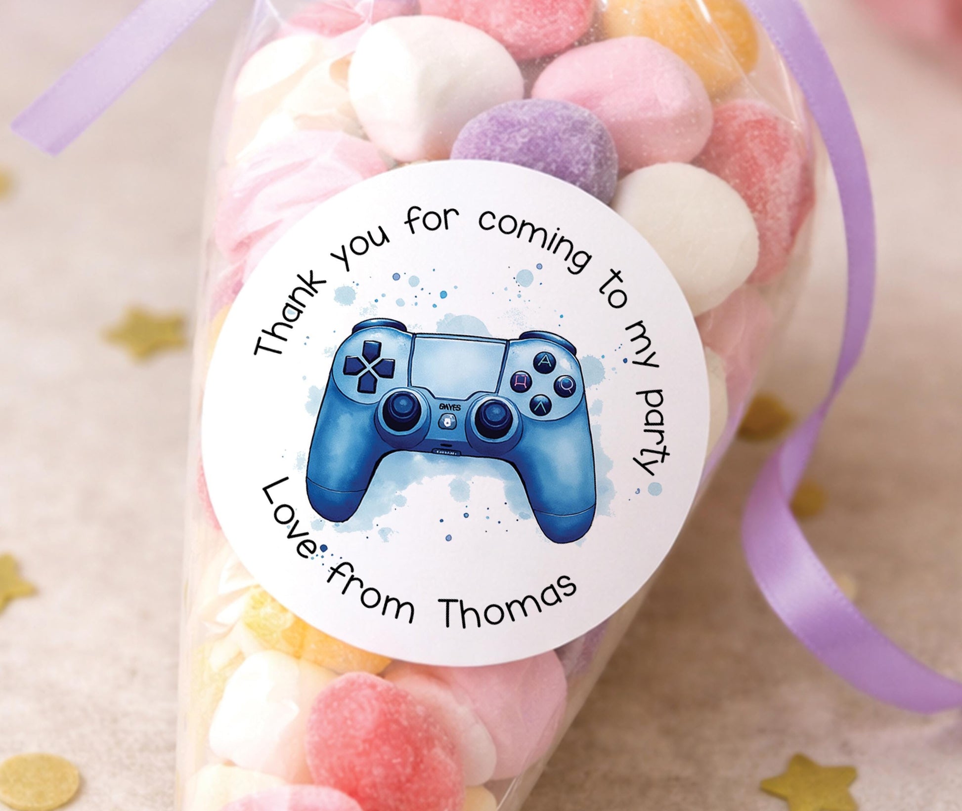 Round glossy stickers featuring a retro games controller and pixel design, personalised as thank-you labels
