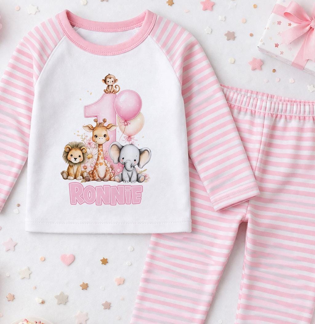 Personalised pink safari animals 1st birthday pyjama set with the child's name printed on soft cotton