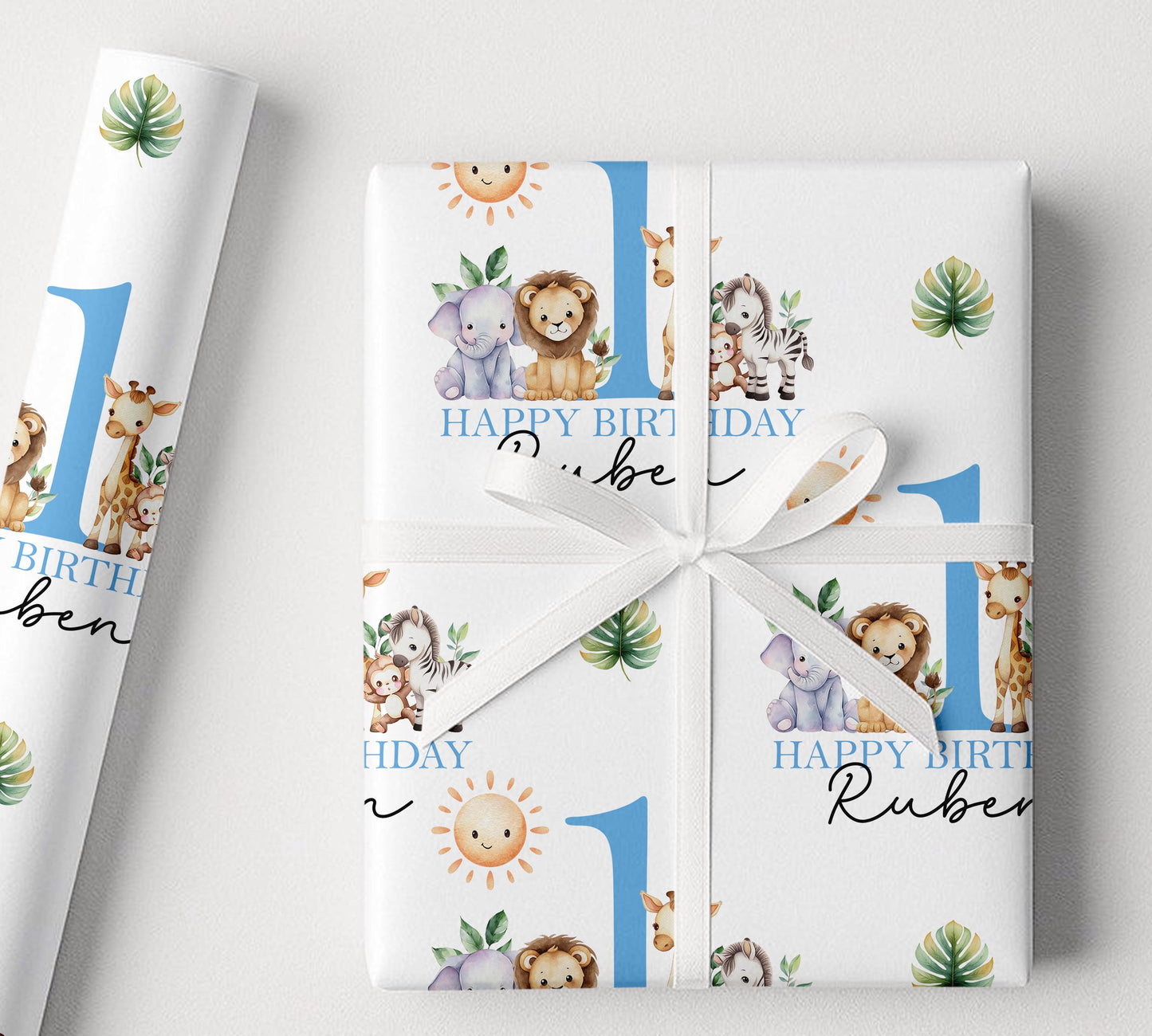 Personalised safari jungle animal 1st birthday wrapping paper wrapped around a gift