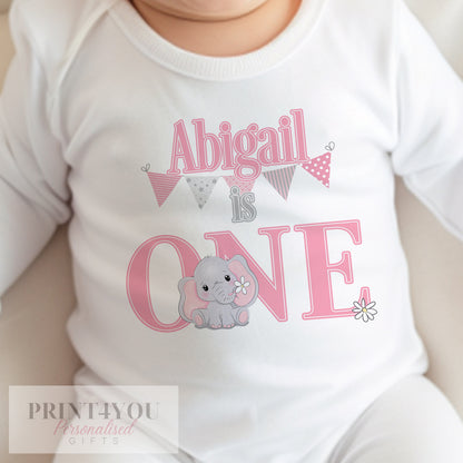 Pink elephant 1st birthday vest, personalised with your baby's name in bold pink lettering.