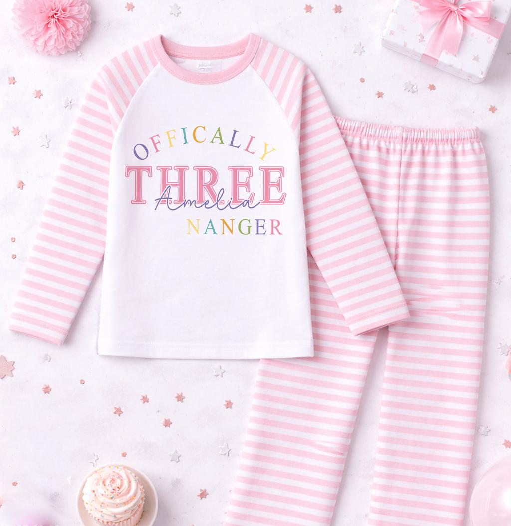 Front view of pink 3rd birthday pyjama set showing the personalised name print