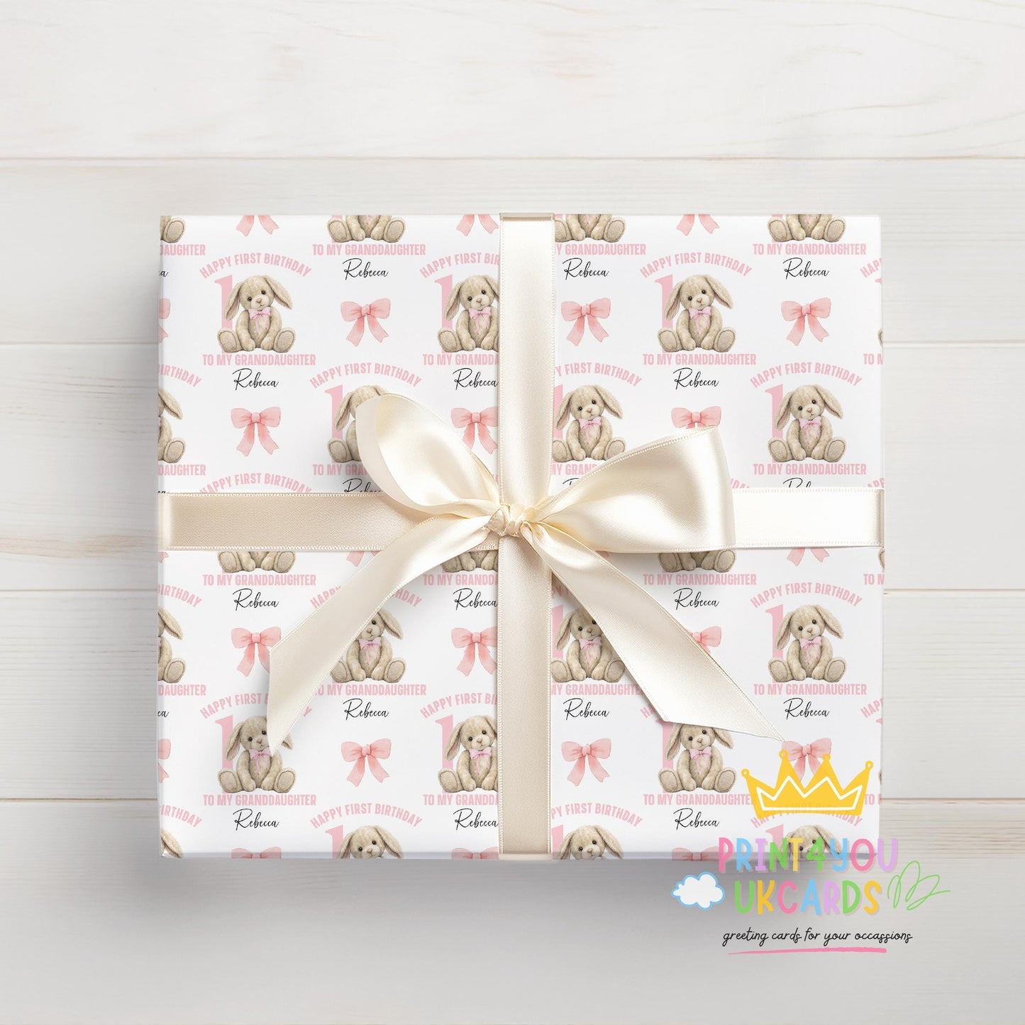 Gift wrapped in the personalised pink rabbit wrapping paper, finished with ribbon