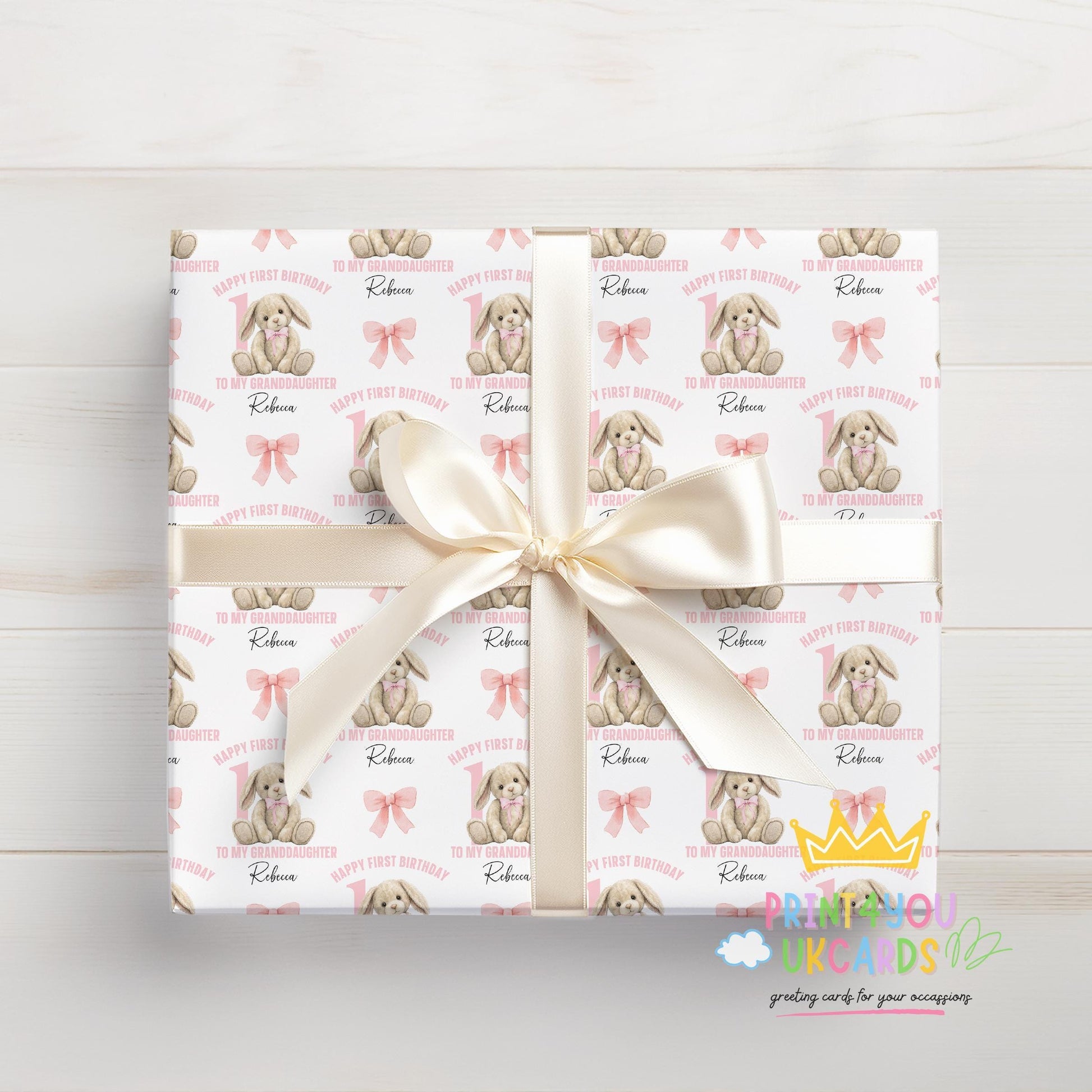 Gift wrapped in the personalised pink rabbit wrapping paper, finished with ribbon