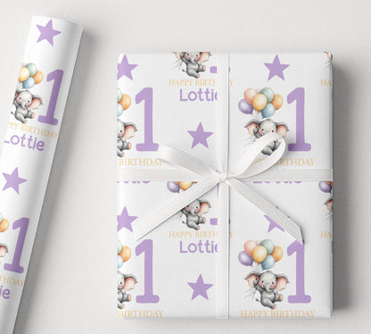 Close-up of the elephant and balloon pattern on the personalised purple birthday wrapping paper.