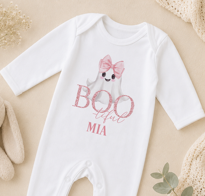 A white onesie with a ghost character and the text "BOO FUL" printed on it, along with the name "MIA" below the character.