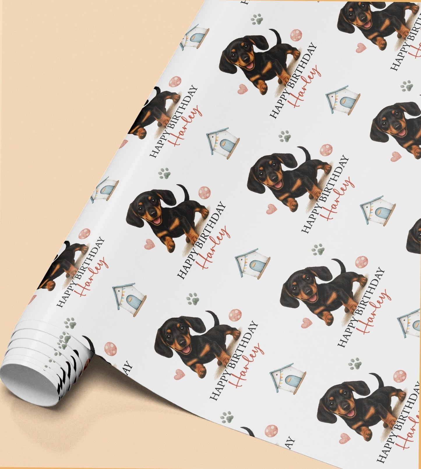 Personalised Dachshund birthday wrapping paper featuring a cute black and tan sausage dog puppy, custom name and birthday message with paw prints and dog toys.