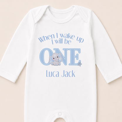 Personalised blue elephant sleepsuit printed with the "When I Wake Up I Will Be One" message and baby's name.