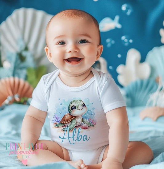 Personalised Sea Turtle bib for newborns, printed with baby's name.