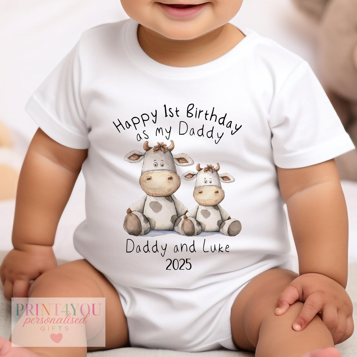 Personalised 'Happy 1st Birthday as my Daddy' sleepsuit, soft cotton printed with the cow design and family name.