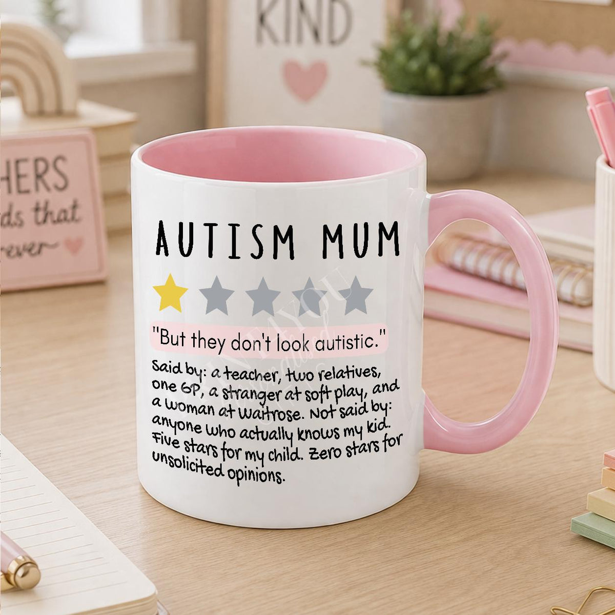White ceramic mug printed with an autism awareness design for autism mums, personalised with a name