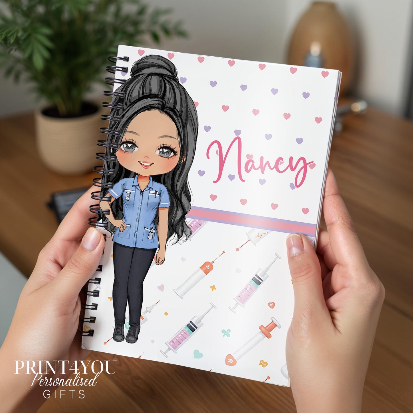Personalised A5 nurse notebook with spiral binding, printed with a custom name and Nurse 3 character design