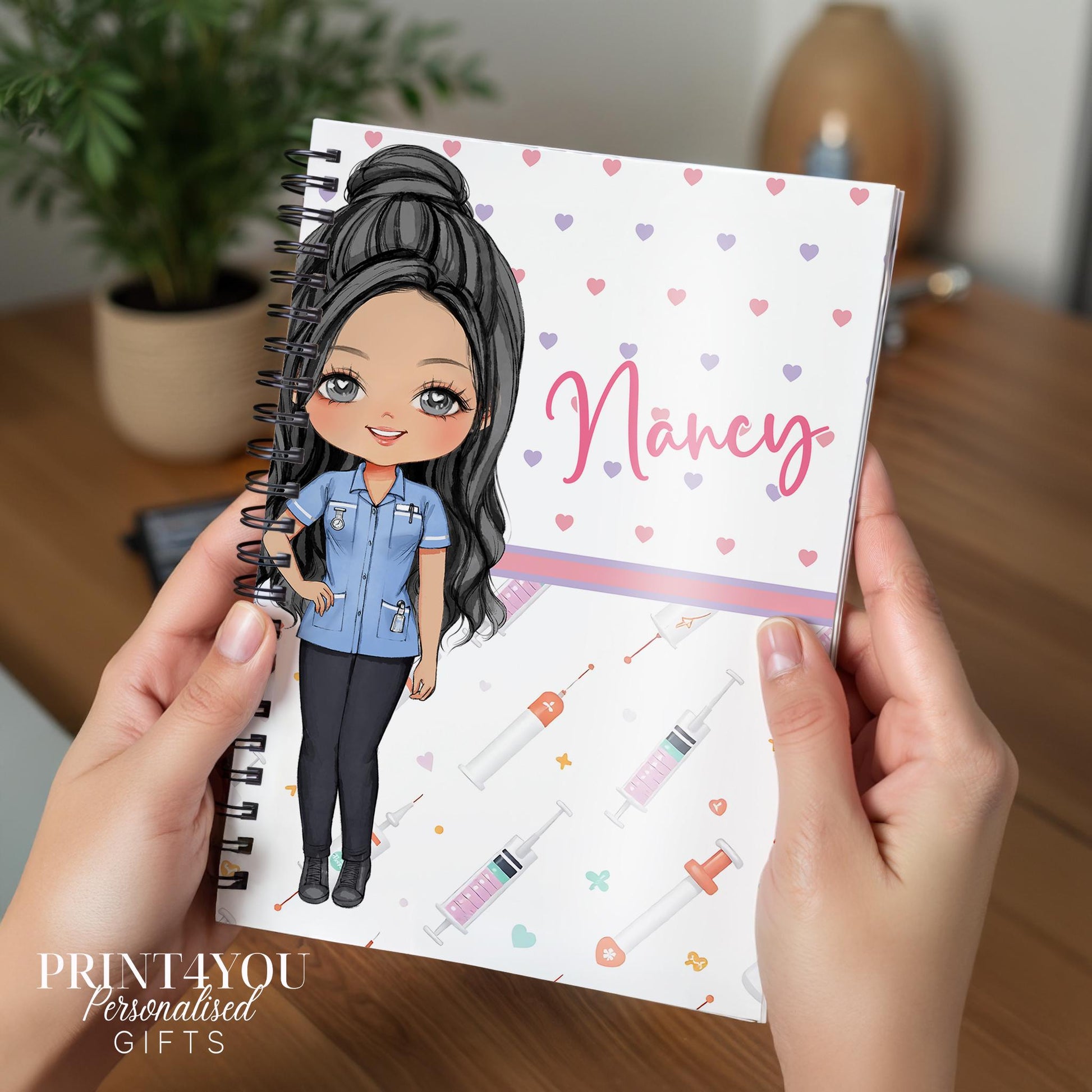 Personalised A5 nurse notebook with spiral binding, printed with a custom name and Nurse 3 character design