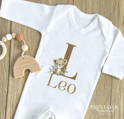 Personalised safari lion baby bib in white cotton with hook and loop fastening