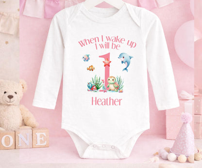 Under-the-sea themed first birthday outfit personalised with a chosen name