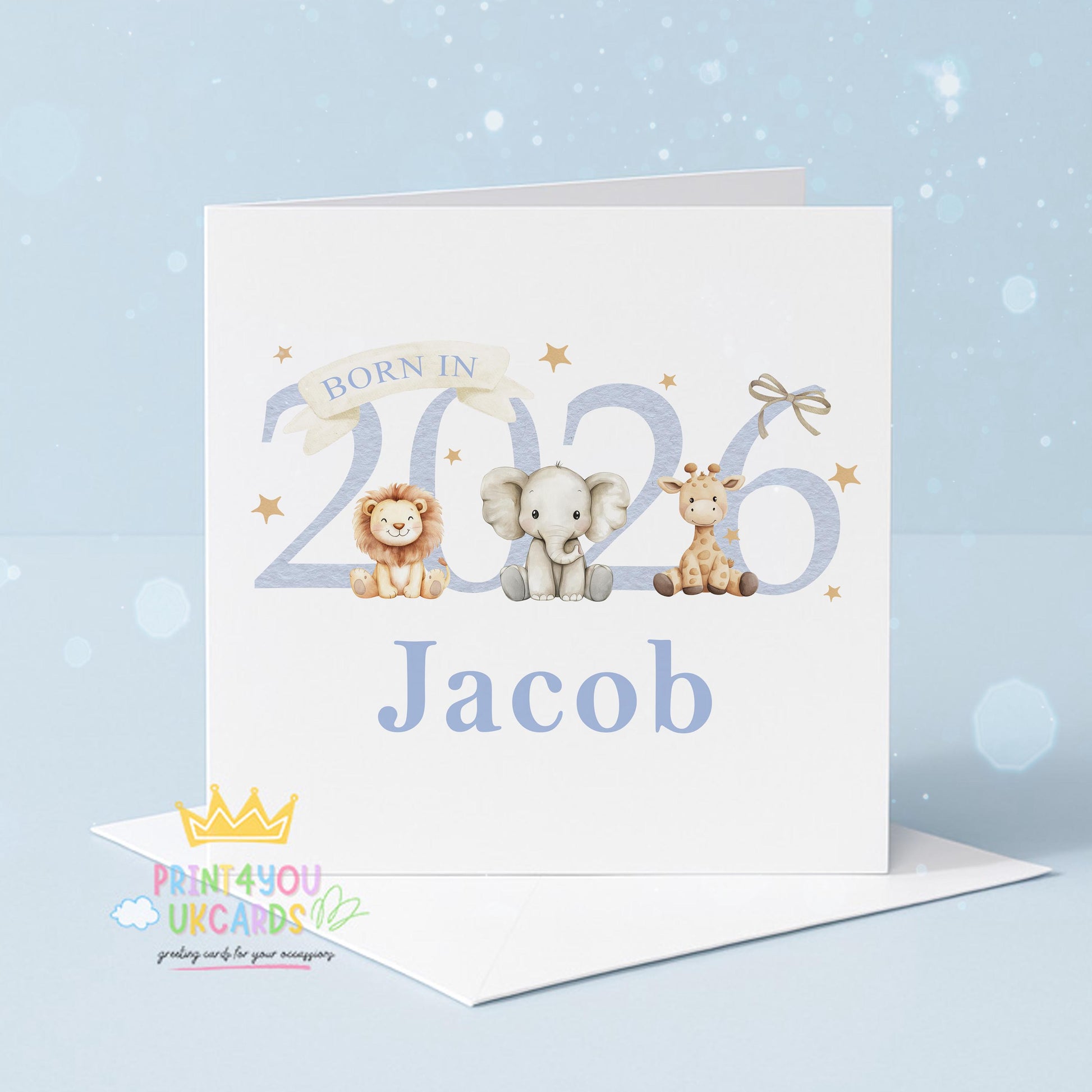 White square greeting card with a lion, elephant and giraffe cub beside the number 2026 and the personalised name Jacob printed below, standing with its envelope.